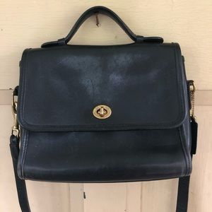 Leather COACH purse with brass clasp and buckles